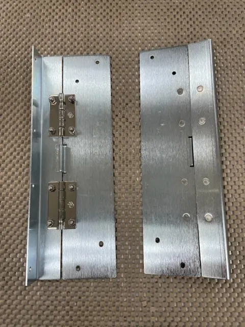 Bracket and hinge shown as a component for manufacturability discussion